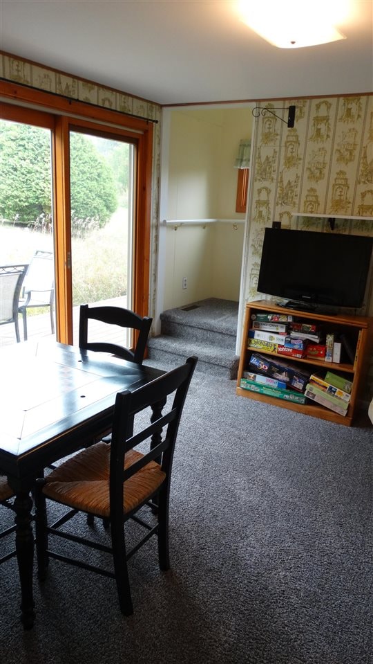 dining area featuring carpet floors