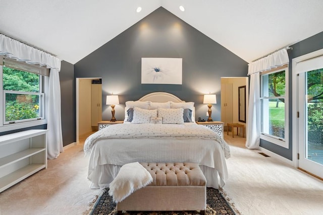 645 Woodhill Ct, Harbor Springs, MI 49740 - bedroom featuring access to outside, light colored carpet, and high vaulted ceiling