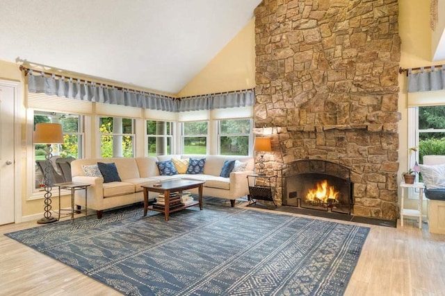 645 Woodhill Ct, Harbor Springs, MI 49740 - living area with wood finished floors, a healthy amount of sunlight, and high vaulted ceiling