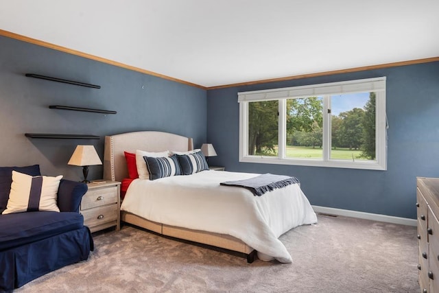 645 Woodhill Ct, Harbor Springs, MI 49740 - carpeted bedroom with baseboards and ornamental molding