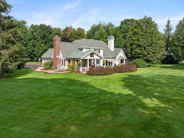 645 Woodhill Ct, Harbor Springs, MI 49740 - back of property with a yard