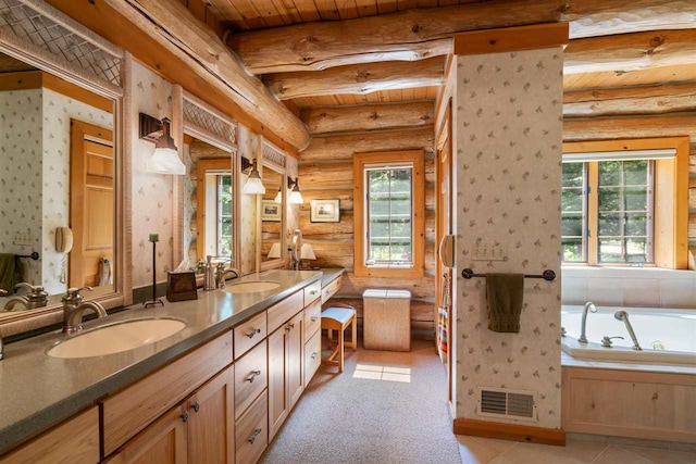 bathroom with a tub, beam ceiling, log walls, and vanity