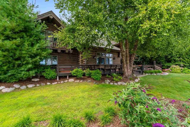 view of yard featuring a deck