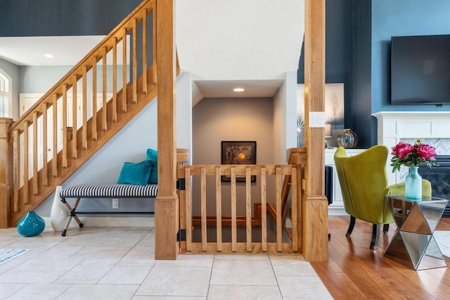 staircase featuring hardwood / wood-style floors