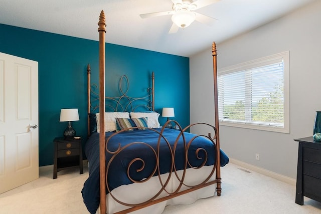 carpeted bedroom featuring ceiling fan