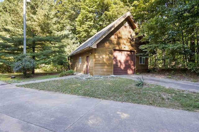 view of home's exterior featuring a garage