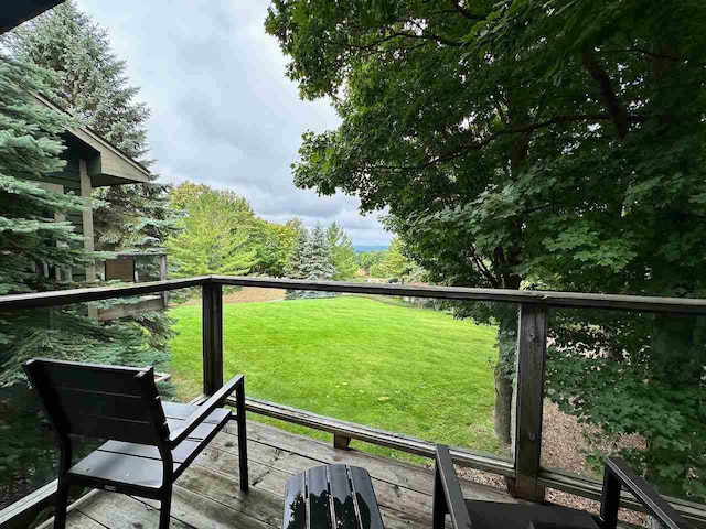 wooden balcony featuring a wooden deck