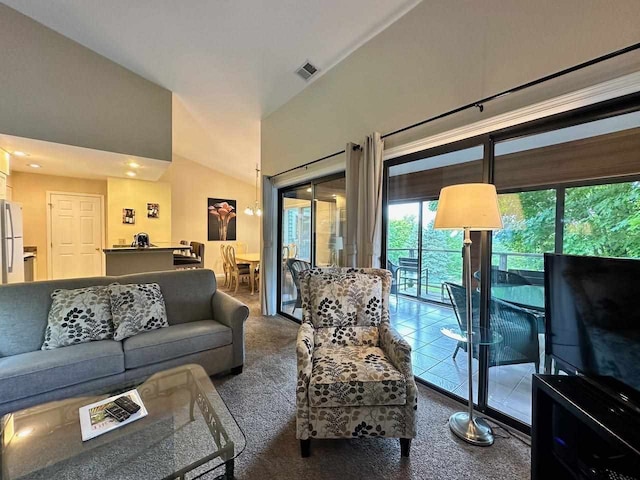 carpeted living room featuring lofted ceiling