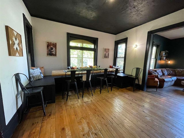 dining area with hardwood / wood-style flooring