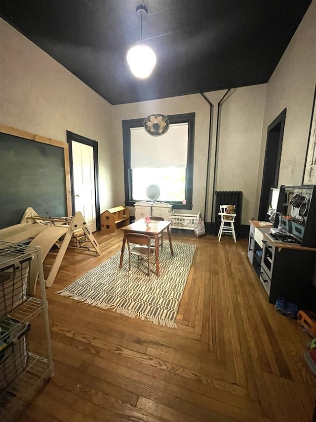 living area featuring hardwood / wood-style floors