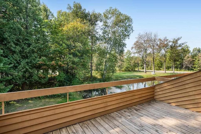 wooden terrace with a water view