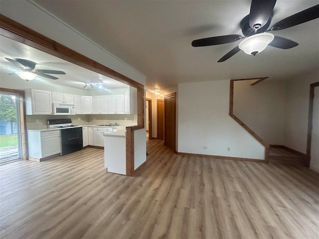 kitchen with light hardwood / wood-style floors, white cabinetry, ceiling fan, and black range with electric stovetop