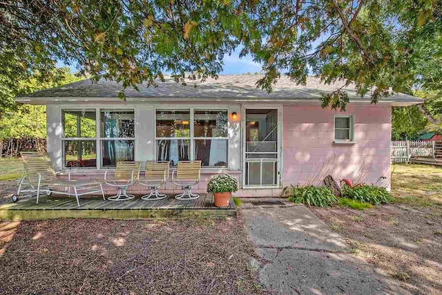 back of property featuring a patio area