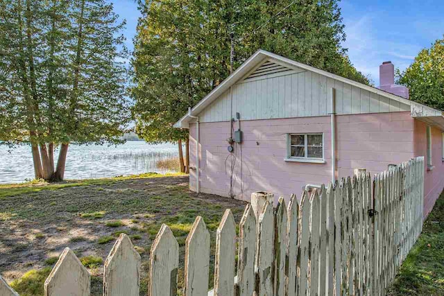 view of side of property with a water view