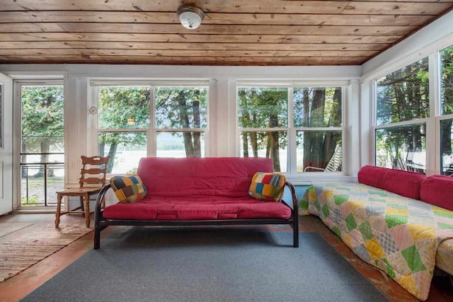 sunroom featuring wooden ceiling