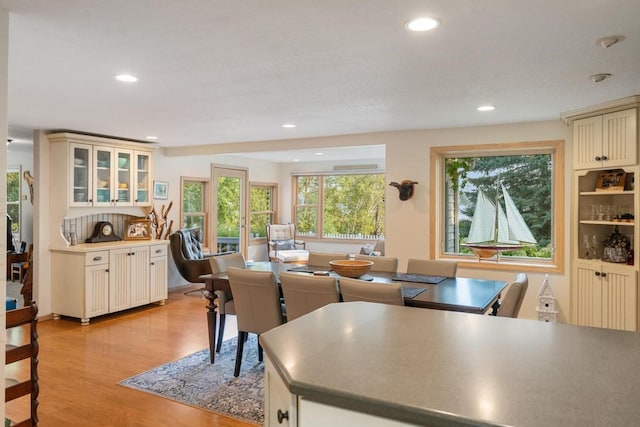 dining area with light hardwood / wood-style flooring