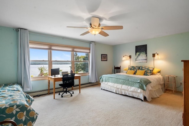 bedroom with ceiling fan, a baseboard radiator, and light carpet