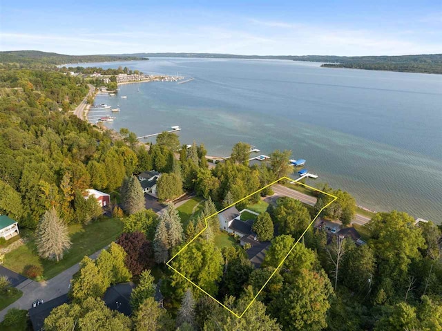 birds eye view of property featuring a water view