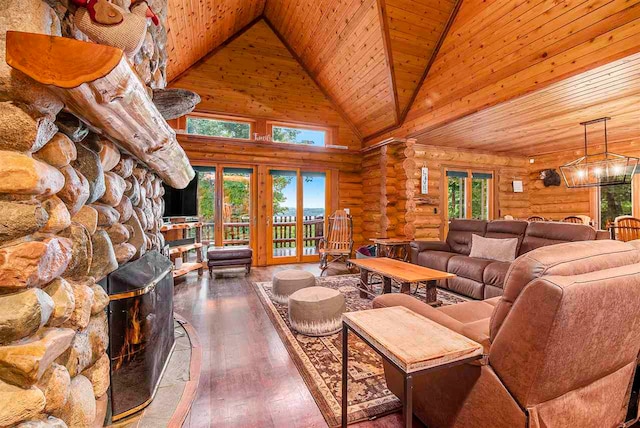 living room featuring wood ceiling, dark hardwood / wood-style flooring, log walls, a stone fireplace, and french doors