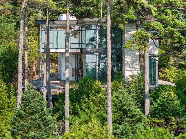 3087 Forrest Ave, Harbor Springs, MI 49740 - exterior space with a sunroom