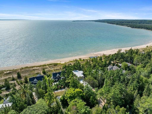 drone / aerial view with a view of the beach and a water view