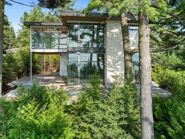 3087 Forrest Ave, Harbor Springs, MI 49740 - view of outdoor structure featuring a sunroom