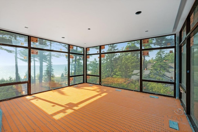 3087 Forrest Ave, Harbor Springs, MI 49740 - unfurnished sunroom with a water view