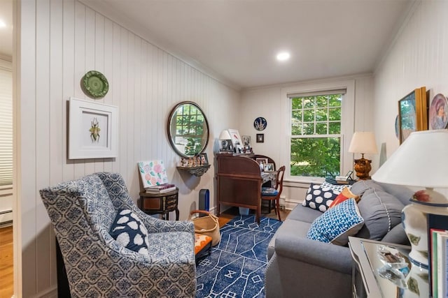 living room featuring ornamental molding and dark wood-type flooring