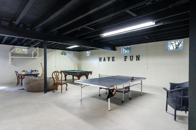 recreation room with a healthy amount of sunlight, concrete flooring, and billiards