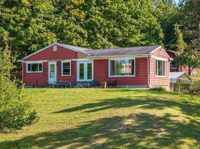 ranch-style home with a front yard