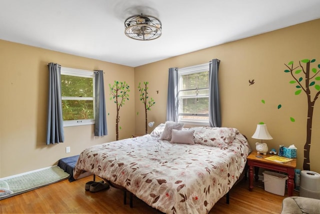 bedroom featuring hardwood / wood-style flooring