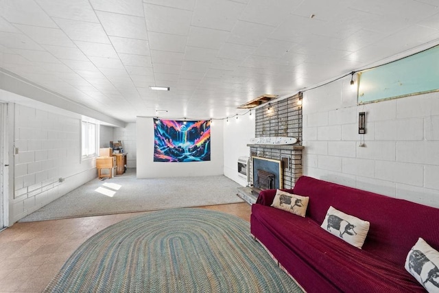 living room featuring a fireplace