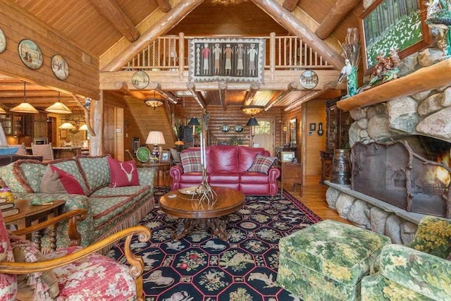 living room featuring wood finished floors, beamed ceiling, wooden walls, high vaulted ceiling, and wood ceiling