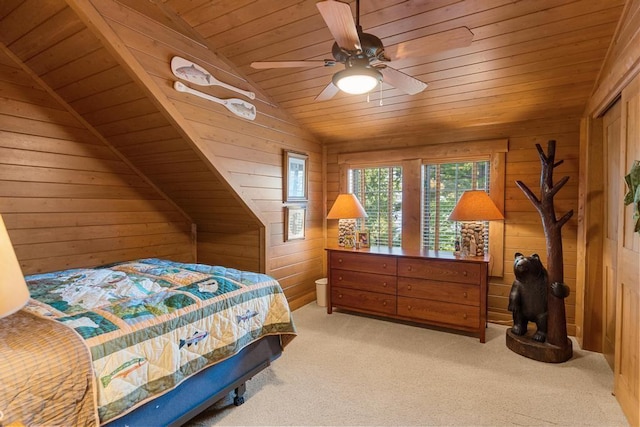 bedroom featuring wood ceiling, light carpet, vaulted ceiling, and wood walls