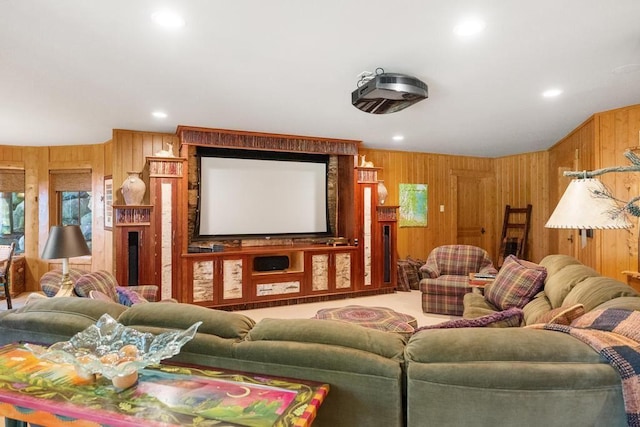 home theater room featuring recessed lighting and wooden walls