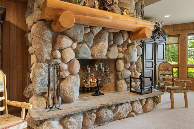 room details featuring recessed lighting, carpet flooring, and wood walls