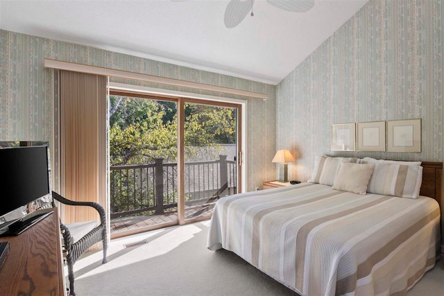 carpeted bedroom featuring access to outside and ceiling fan