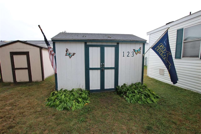 view of outdoor structure featuring a yard