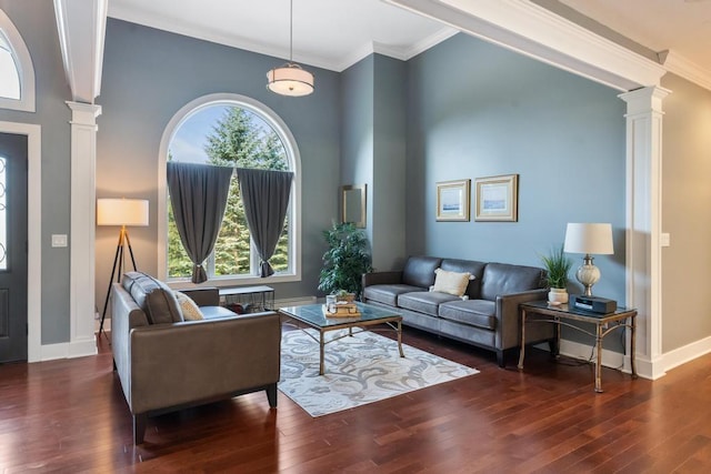 290 Mitchell Hills Dr, Petoskey, MI 49770 - living area with decorative columns, wood-type flooring, ornamental molding, and baseboards