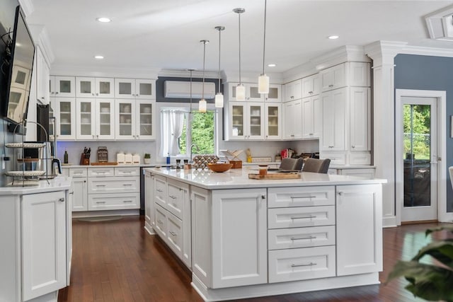 290 Mitchell Hills Dr, Petoskey, MI 49770 - kitchen featuring white cabinets, light countertops, dark wood-style flooring, recessed lighting, and crown molding