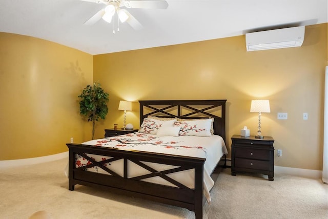 290 Mitchell Hills Dr, Petoskey, MI 49770 - bedroom with a wall mounted air conditioner, carpet floors, baseboards, and a ceiling fan