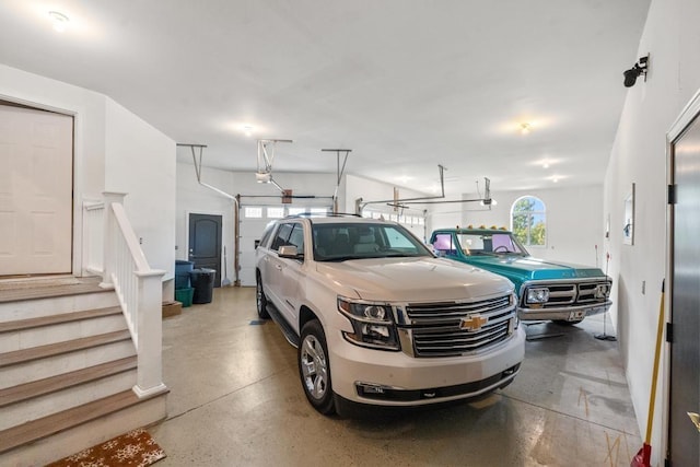 290 Mitchell Hills Dr, Petoskey, MI 49770 - garage with a garage door opener