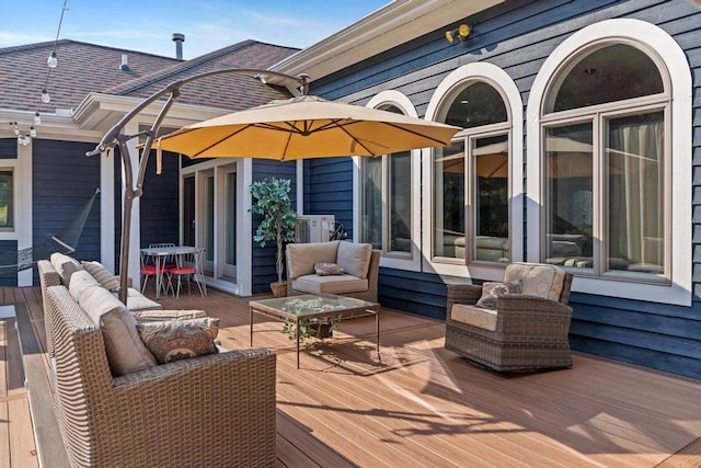 290 Mitchell Hills Dr, Petoskey, MI 49770 - deck featuring outdoor dining area and outdoor lounge area