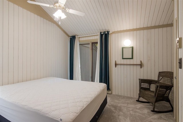 2500 Josef Strasse Unit 410/411, Bellaire, MI 49615 - carpeted bedroom featuring wooden walls, a ceiling fan, and lofted ceiling