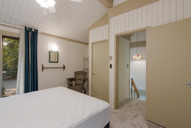 bedroom with lofted ceiling, ceiling fan, and light colored carpet