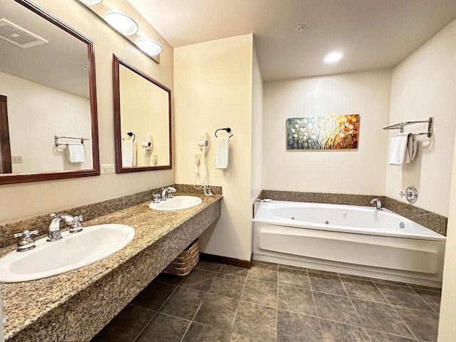 bathroom featuring vanity and a washtub