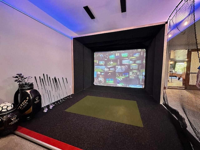 recreation room with golf simulator