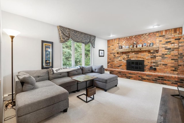 living room with a fireplace, light colored carpet, and brick wall