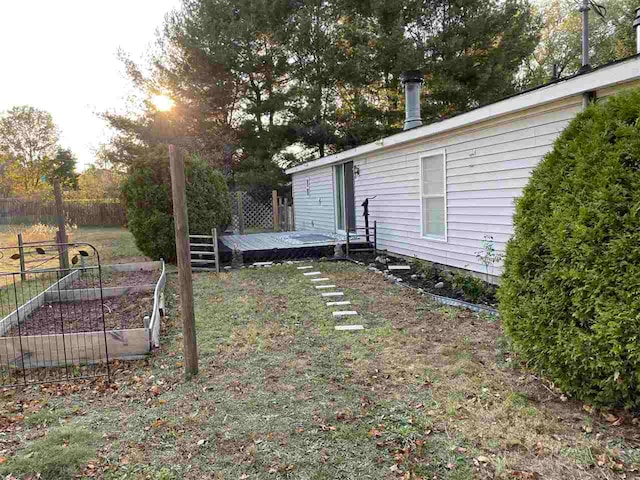 view of yard featuring a deck