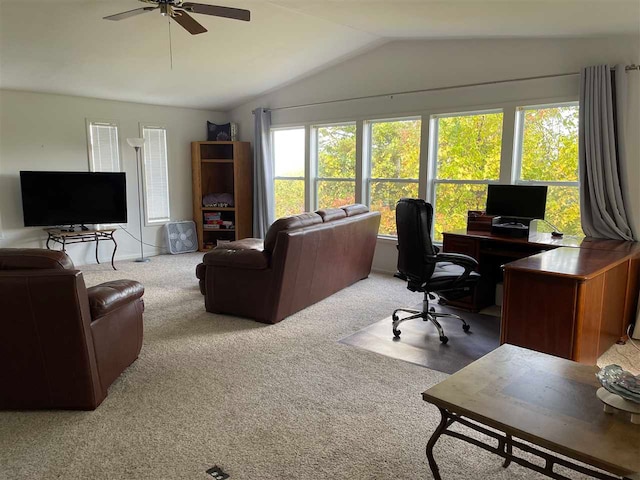 office with light colored carpet, vaulted ceiling, and a wealth of natural light